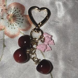 Elegant Gold cherries with bow  bagcharm
